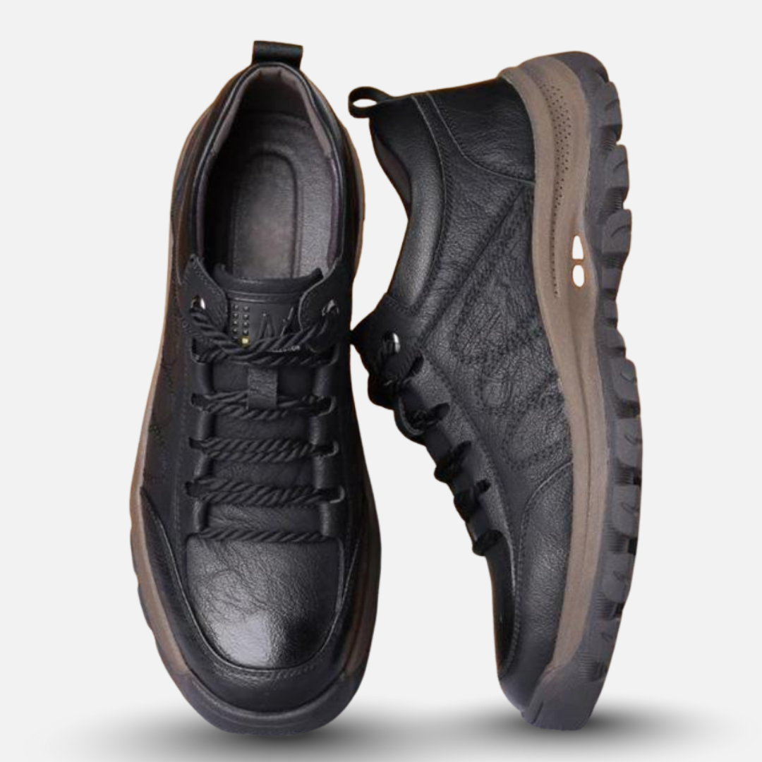 Pair of black leather sneakers