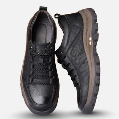 Pair of black leather sneakers